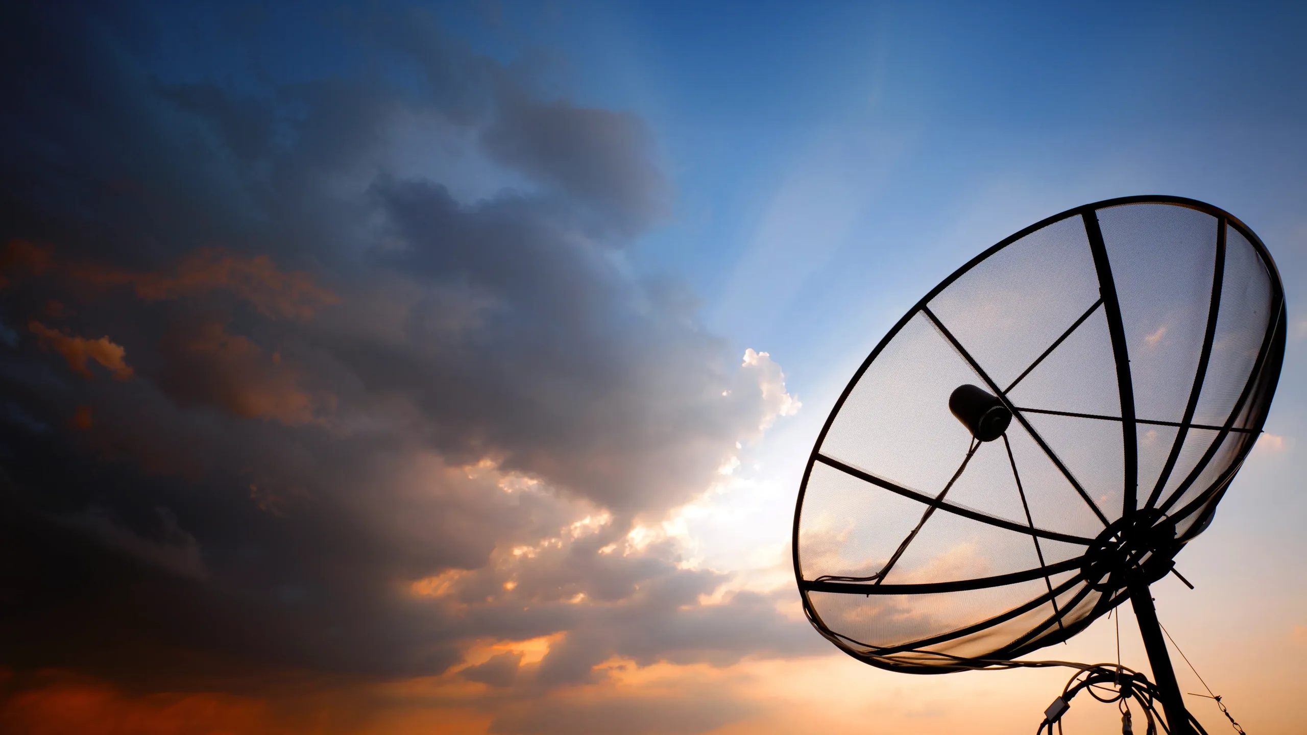 Satellite dish at sunset